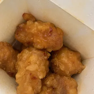 Orange Chicken. This is spicy hot. This is a pint comes with white rice.