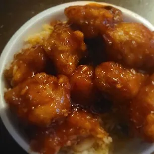 Bowl with fried rice and orange chicken
