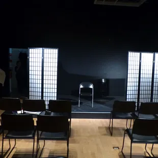 empty chairs in a dark room