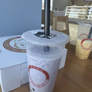 Taro milk tea and mango milk tea with boba