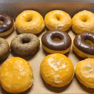 Dozen doughnuts of yeast, chocolate iced yeast, blueberry cake, raspberry filled yeast, and lemon filled yeast. Extremely light and fluffy.