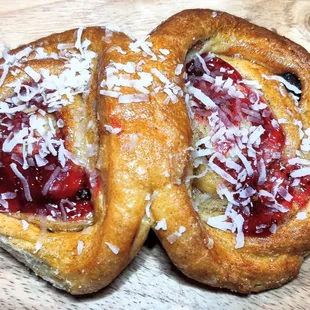 two pastries on a cutting board