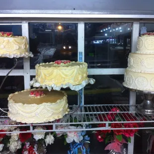 a variety of cakes on display