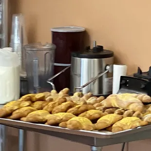 a tray of doughnuts on a table