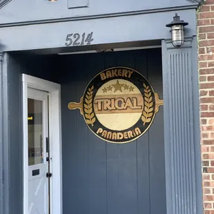 the entrance to a brick building