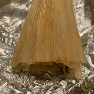 Red tamale- they are good sized, very filling.  The green w/ chicken were our fave  but they didn't make it to the pics!
