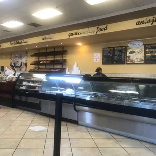 people standing in line at the counter