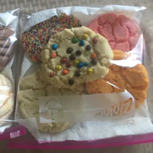 Pirate cookie, white polvorone cookie, golden polvorone cookie, pink polvorone cookie, and M&amp;M polvorone cookie