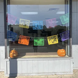 halloween decorations in a store window