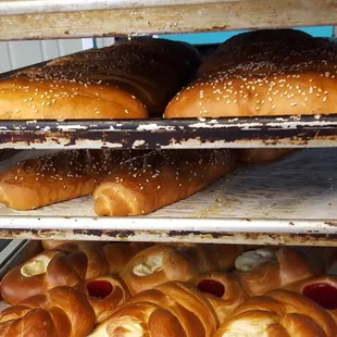 The ones with sesame are filled with cream cheese and jalapeños.