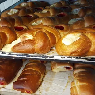 a variety of hot dogs in buns