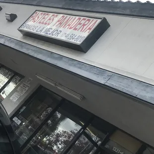 a car parked in front of a restaurant