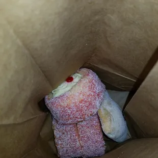 a teddy bear in a bag