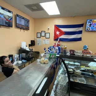 a woman sitting at a counter