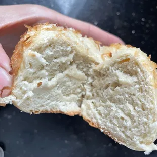 Bready (not dry but not light) bun w/coconut &amp; sugar top. $4 or 3/$10 mix/match. Needs more topping or some filling.