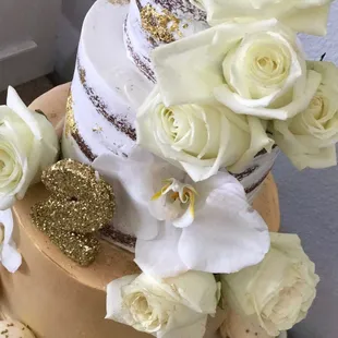 a wedding cake with white flowers