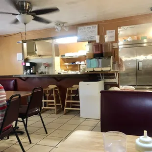 Restaurant in back of grocery / bakery