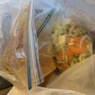 a sandwich in a plastic bag