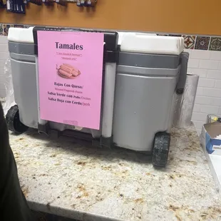 a panaderia with a pink sign on it
