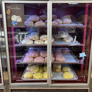a display case full of pastries
