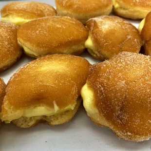 Donas rellenas de crema y de arroz con leche