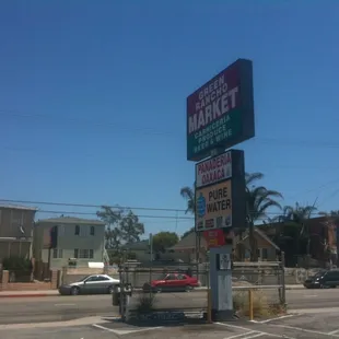 Street sign in parking lot shared with other businesses