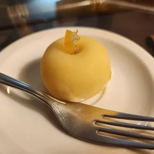 a dessert on a plate with a fork