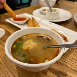 a bowl of soup on a table