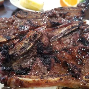 a plate of steak and rice