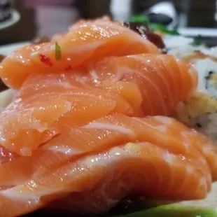 a plate of salmon and rice