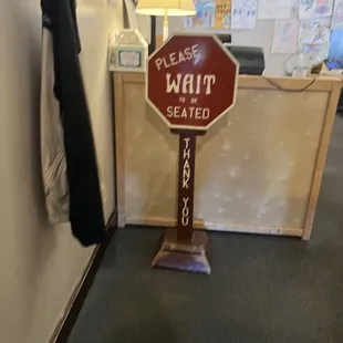 Wait to be seated when you enter