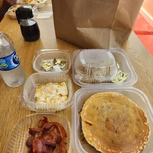 Blueberry pancakes, hash, bacon, &amp; over medium eggs