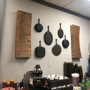 pans hanging on the wall
