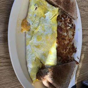 an omelet and toast on a plate