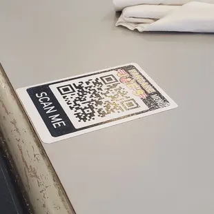 a qr code sticker on a table