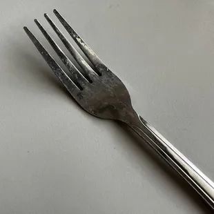This is the second fork they brought me &amp; it had dried egg on it .