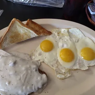 Chicken fried steak sunny side up eggs