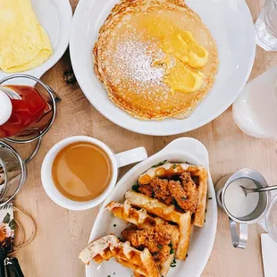 Side of folded eggs, Lemon and Ricotta Pancakes, Chicken and Waffles.