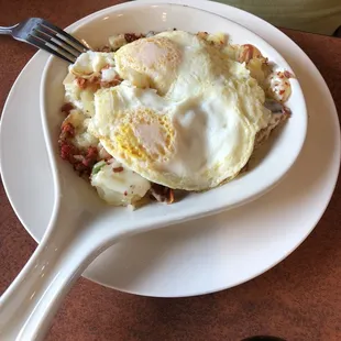 Mexican skillet- filled with crispy home fries, chorizo, jalapeños, cheese and eggs
