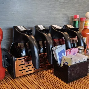 a row of condiments on a table