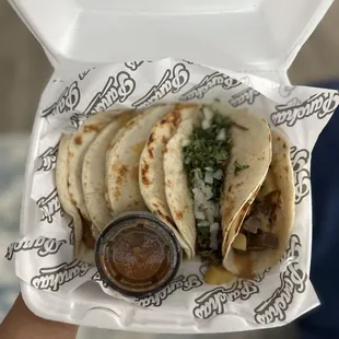 Barbacoa, guisado and queso con chile tacos
