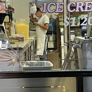 In the back not responding to customer but was too busy in his phone