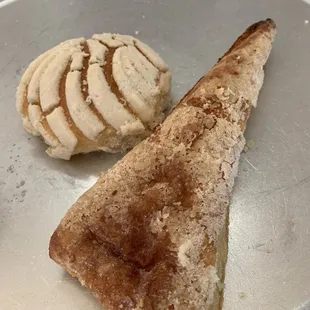 a piece of bread and a scoop of ice cream