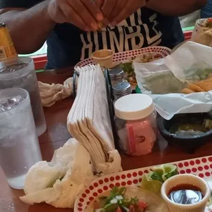Berrian tacos, shrimp, tilapia tacos, and steak burritos