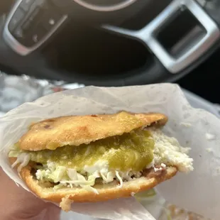 Panchitas Gorditas ($5) filled with chicharrón seco, cabbage, onion, cilantro, queso fresco, sour cream, and mild green salsa.  Delicious!