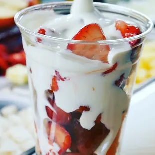 Fresas con crema- fresh strawberries covered  with a thick sweet cream and topped with granola and raisins