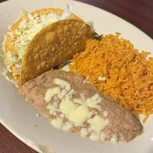 Shredded beef tacos with rice and beans