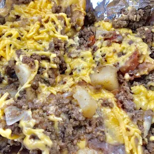 Soggy, nasty tasting Picadillo and POTATOES nachos.