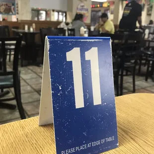 They bring your order to the table once you've ordered at the counter