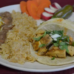 #1  two chicken tacos rice &amp; beans